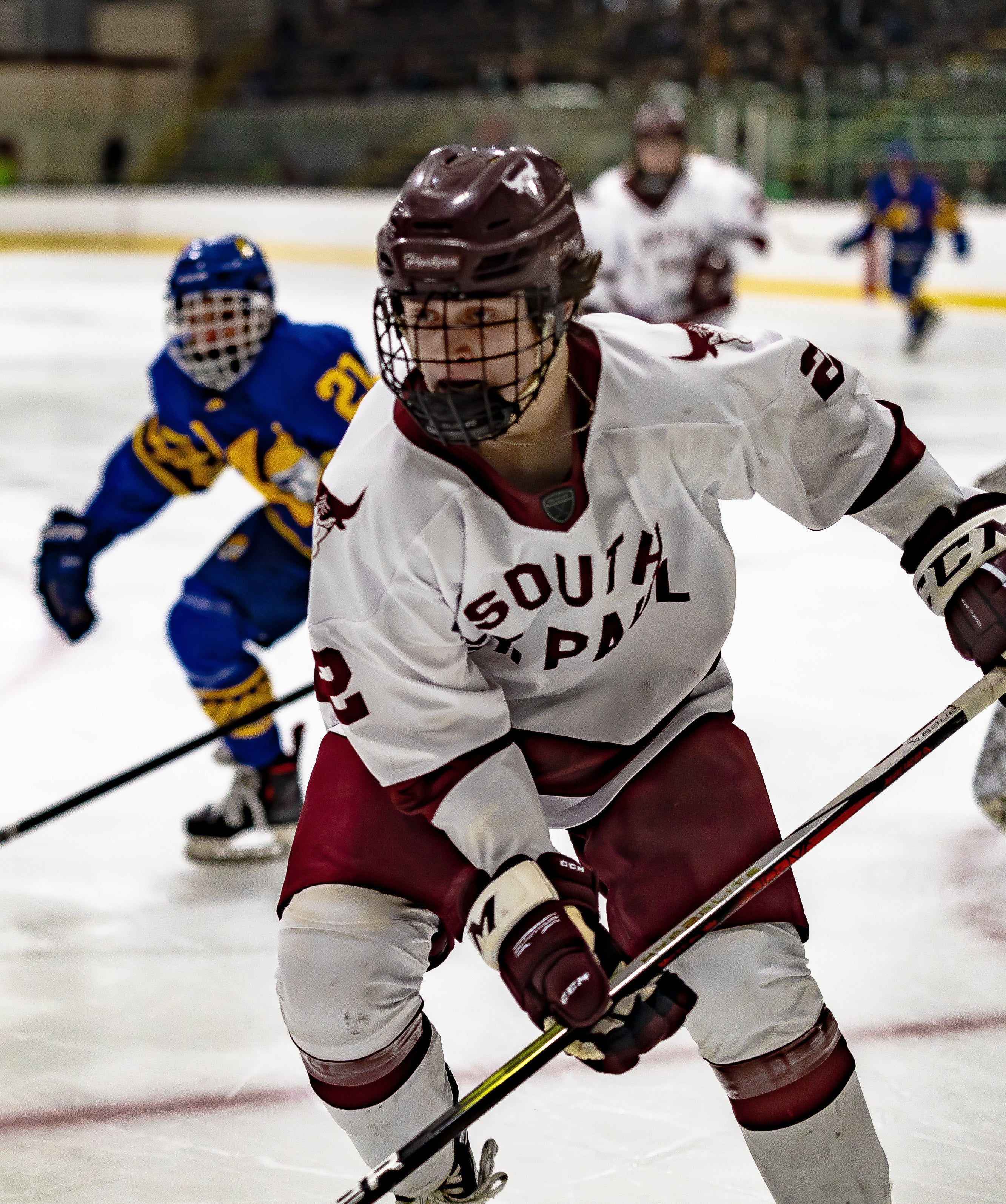 South St Paul hockey in a white jersey